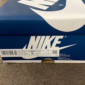 New - (never worn) Retro Air Jordan 1: true blue white-cement grey. Size 5Y